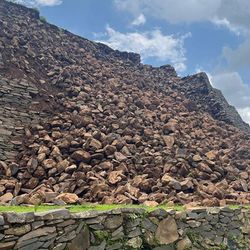 A collapsed pyramid at site of Ihuatzio in Mexico, INAH.