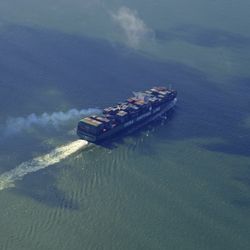 A cargo ship cruises in the South China Sea near Hong Kong, China 